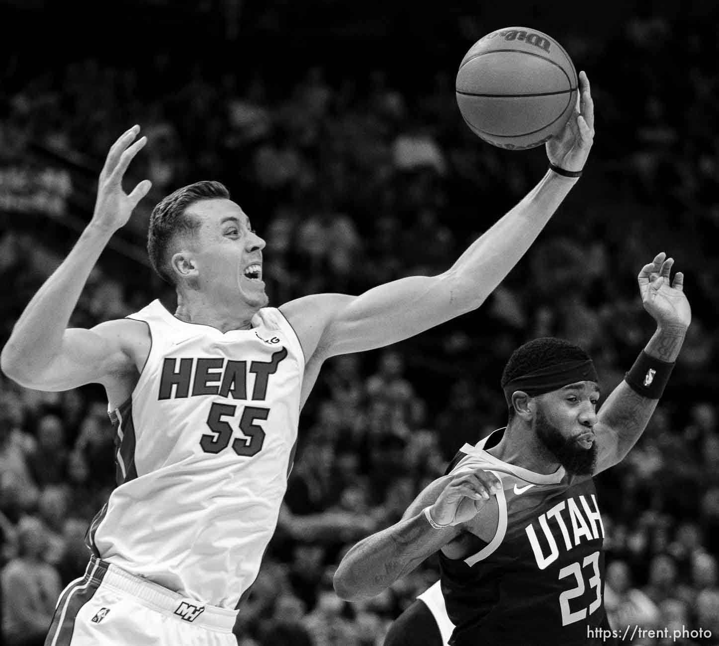 (Trent Nelson  |  The Salt Lake Tribune) Miami Heat guard Duncan Robinson (55) and Utah Jazz forward Royce O'Neale (23) as the Utah Jazz host the Miami Heat, NBA basketball in Salt Lake City on Saturday, Nov. 13, 2021.