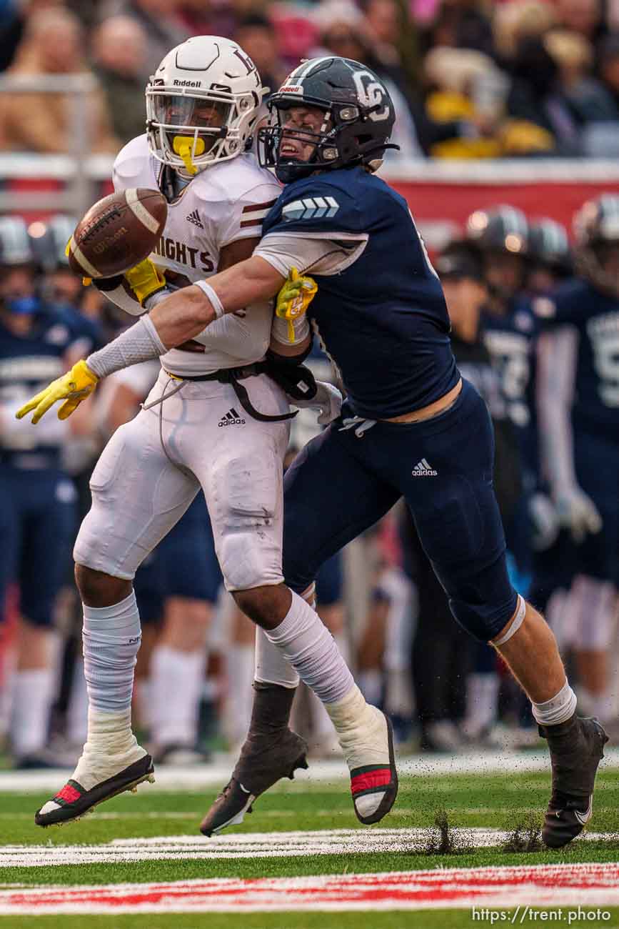 (Trent Nelson  |  The Salt Lake Tribune) Corner Canyon's Harrison Taggart (9) knocks a pass away from Lone Peak's Luke Hyde (2) as Lone Peak faces Corner Canyon in the 6A high school football championship game in Salt Lake City on Friday, Nov. 19, 2021.