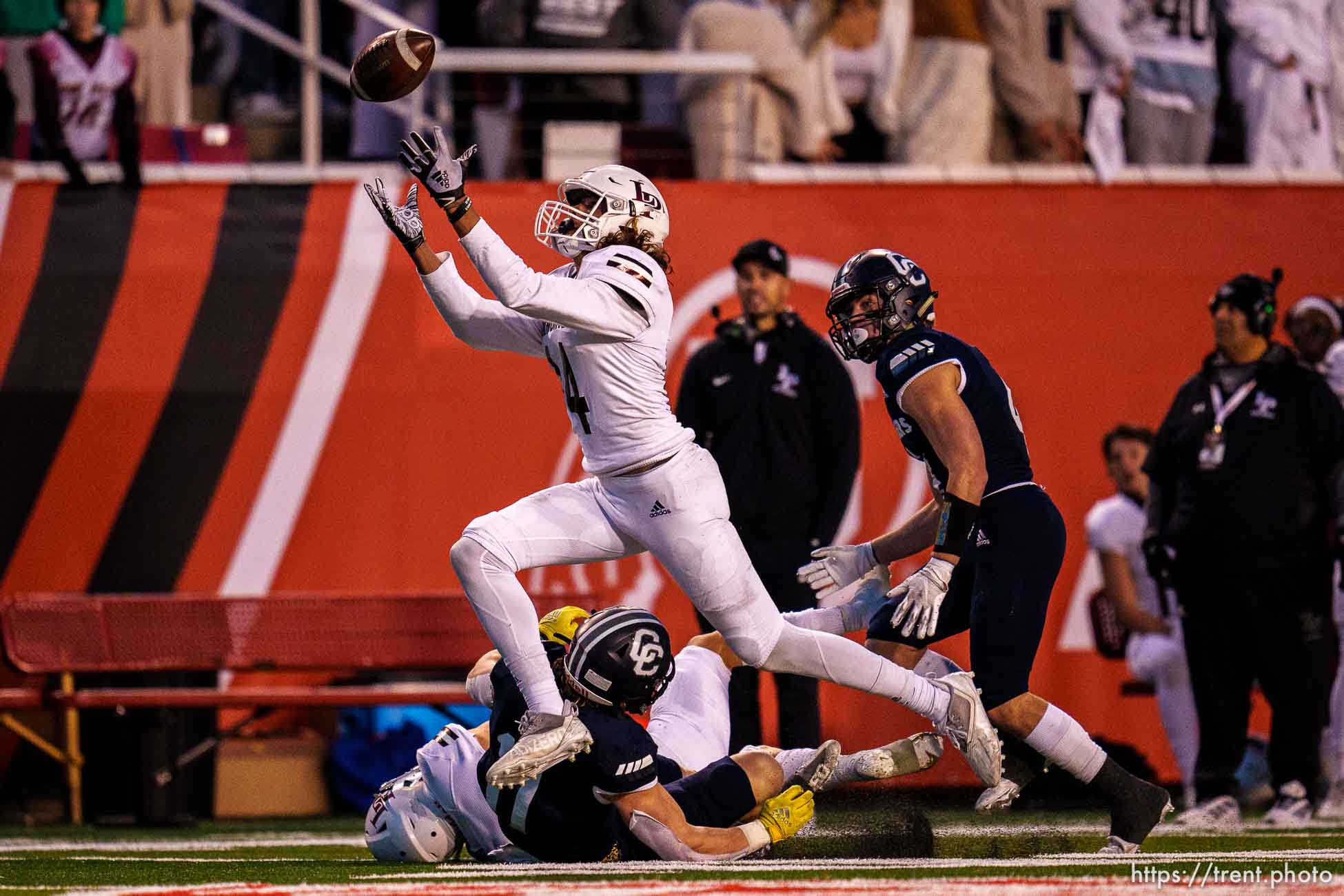 (Trent Nelson  |  The Salt Lake Tribune) Lone Peak's Takeao Hansen (14) makes the game-clinching interception as Lone Peak faces Corner Canyon in the 6A high school football championship game in Salt Lake City on Friday, Nov. 19, 2021.