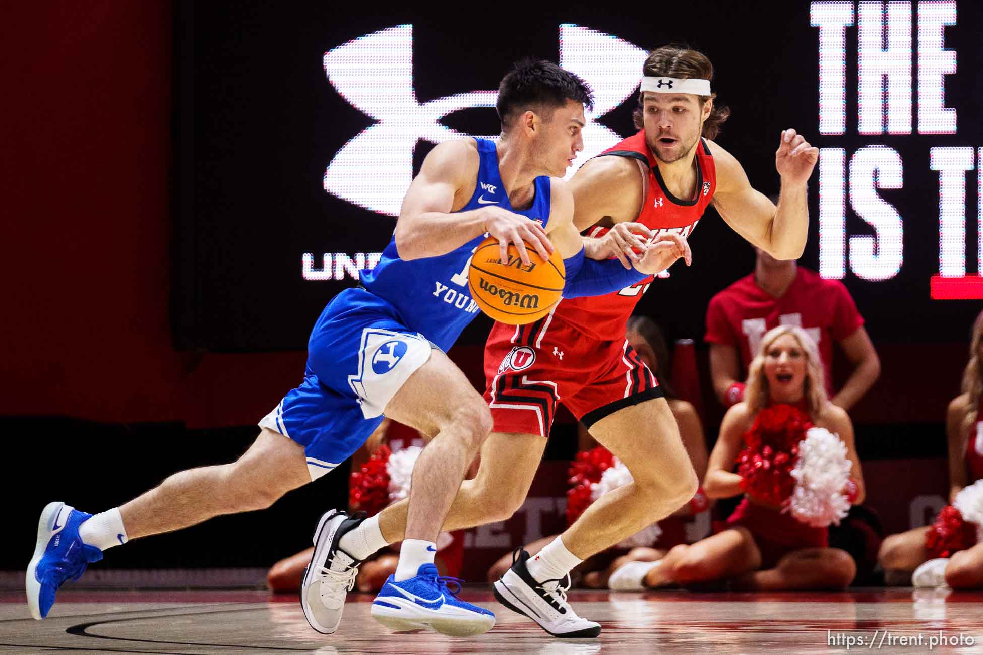 (Trent Nelson  |  The Salt Lake Tribune) Utah Utes guard Rollie Worster (25) defends Brigham Young Cougars guard Alex Barcello (13) as the Utah Utes host BYU, NCAA basketball in Salt Lake City on Saturday, Nov. 27, 2021.