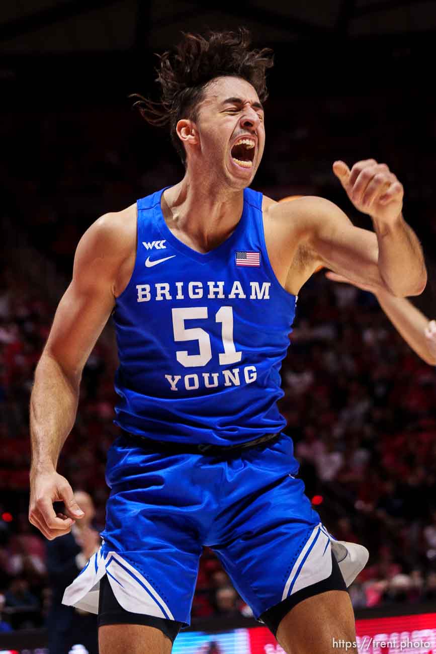 (Trent Nelson  |  The Salt Lake Tribune) Brigham Young Cougars forward Gavin Baxter (51) dunks the ball as the Utah Utes host BYU, NCAA basketball in Salt Lake City on Saturday, Nov. 27, 2021.