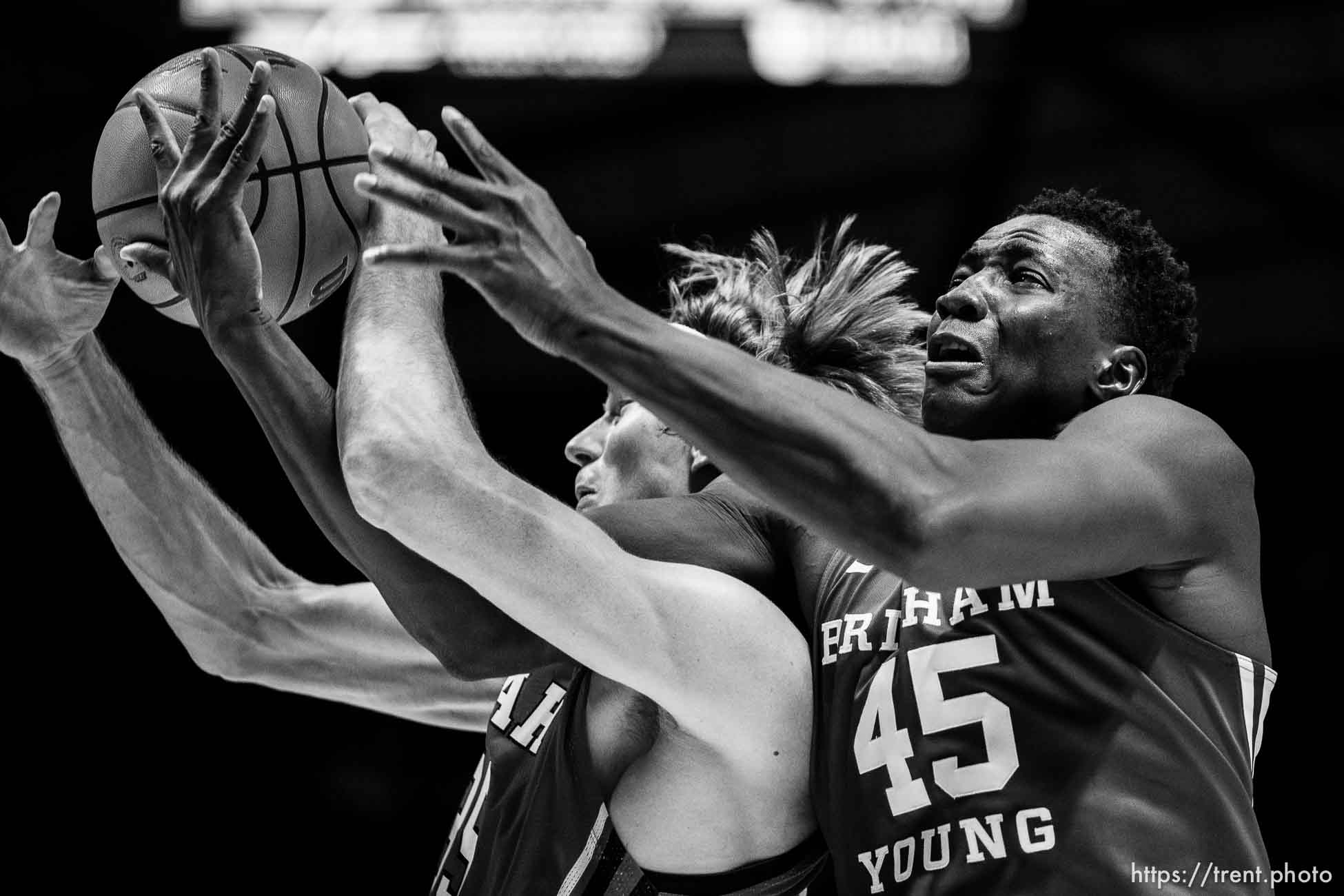 (Trent Nelson  |  The Salt Lake Tribune) Utah Utes center Branden Carlson (35) and Brigham Young Cougars forward Fousseyni Traore (45) as the Utah Utes host BYU, NCAA basketball in Salt Lake City on Saturday, Nov. 27, 2021.