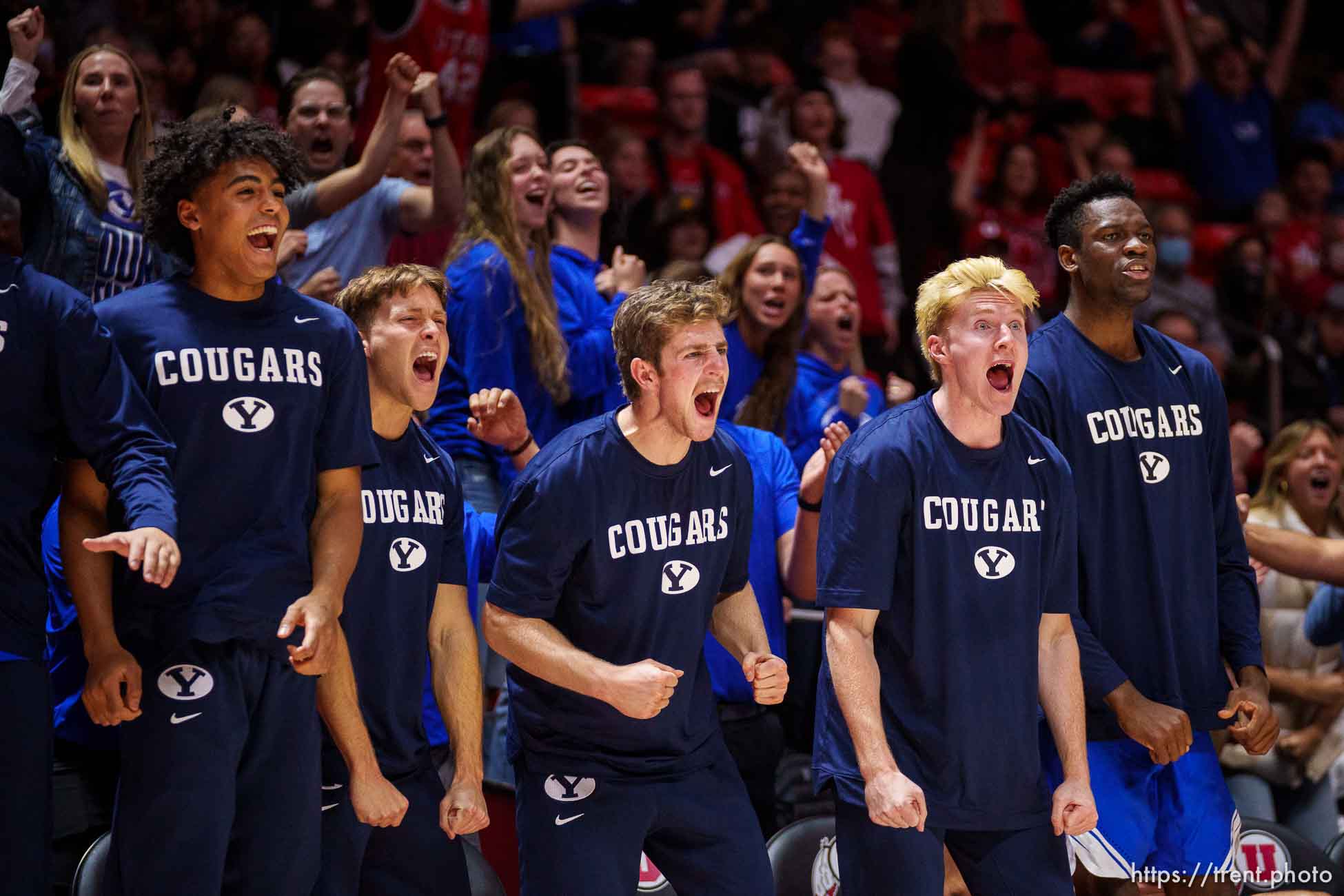 (Trent Nelson  |  The Salt Lake Tribune) BYU players celebrate a late score as the Utah Utes host BYU, NCAA basketball in Salt Lake City on Saturday, Nov. 27, 2021.