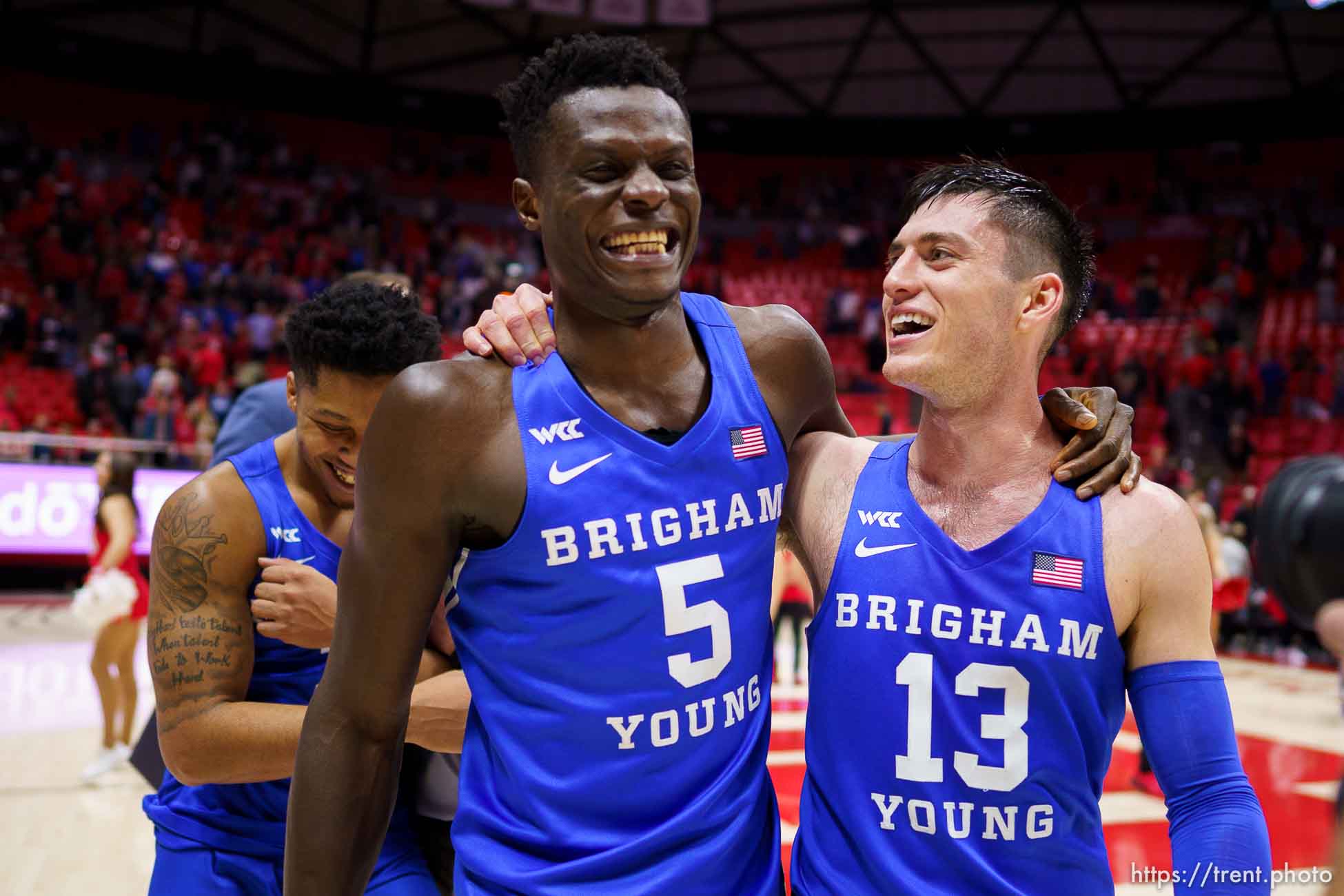 (Trent Nelson  |  The Salt Lake Tribune) Brigham Young Cougars forward Gideon George (5) and Brigham Young Cougars guard Alex Barcello (13) walk off the court after the win as the Utah Utes host BYU, NCAA basketball in Salt Lake City on Saturday, Nov. 27, 2021.