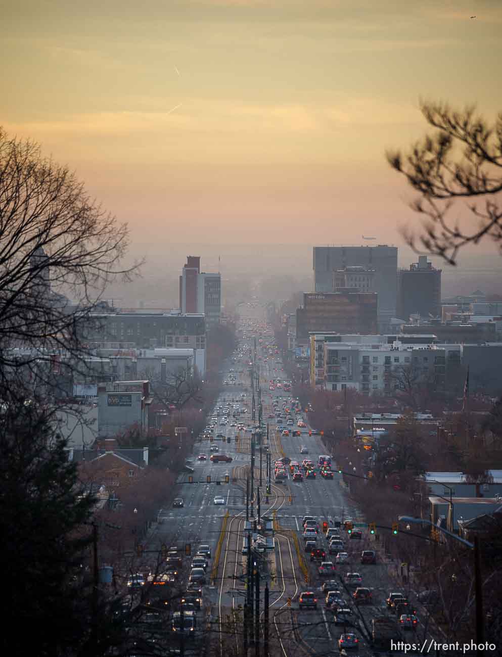 (Trent Nelson  |  The Salt Lake Tribune) A hazy sunset over 400 South in Salt Lake City on Tuesday, Nov. 30, 2021.