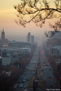 (Trent Nelson  |  The Salt Lake Tribune) A hazy sunset over 400 South in Salt Lake City on Tuesday, Nov. 30, 2021.