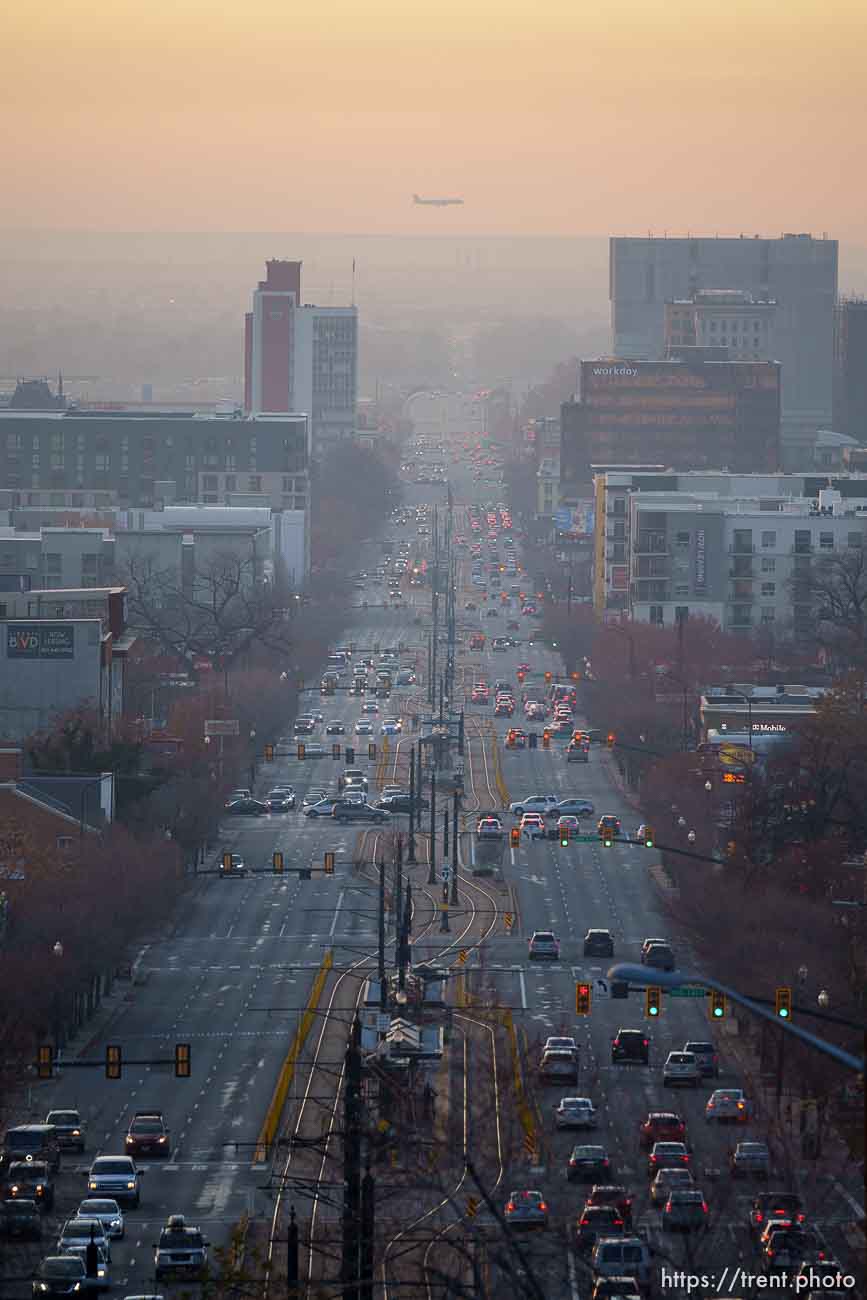 (Trent Nelson  |  The Salt Lake Tribune) A hazy sunset over 400 South in Salt Lake City on Tuesday, Nov. 30, 2021.