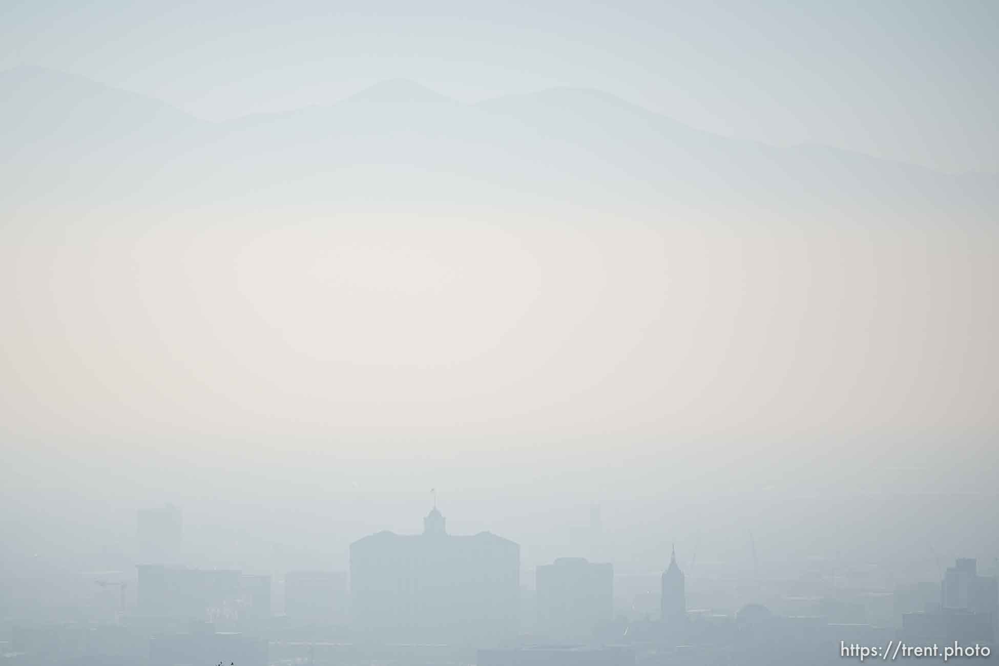 (Trent Nelson  |  The Salt Lake Tribune) Poor air quality obscures the Oquirrh Mountains and downtown Salt Lake City, as seen from the University of Utah on Friday, Dec. 3, 2021.