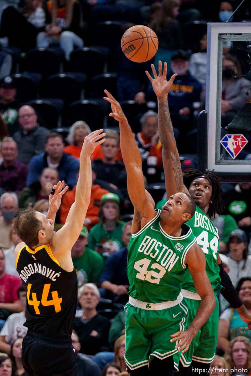 (Trent Nelson  |  The Salt Lake Tribune) Utah Jazz forward Bojan Bogdanovic (44) shoots over Boston Celtics center Al Horford (42) and Boston Celtics center Robert Williams III (44) as the Utah Jazz host the Boston Celtics, NBA basketball in Salt Lake City on Friday, Dec. 3, 2021.