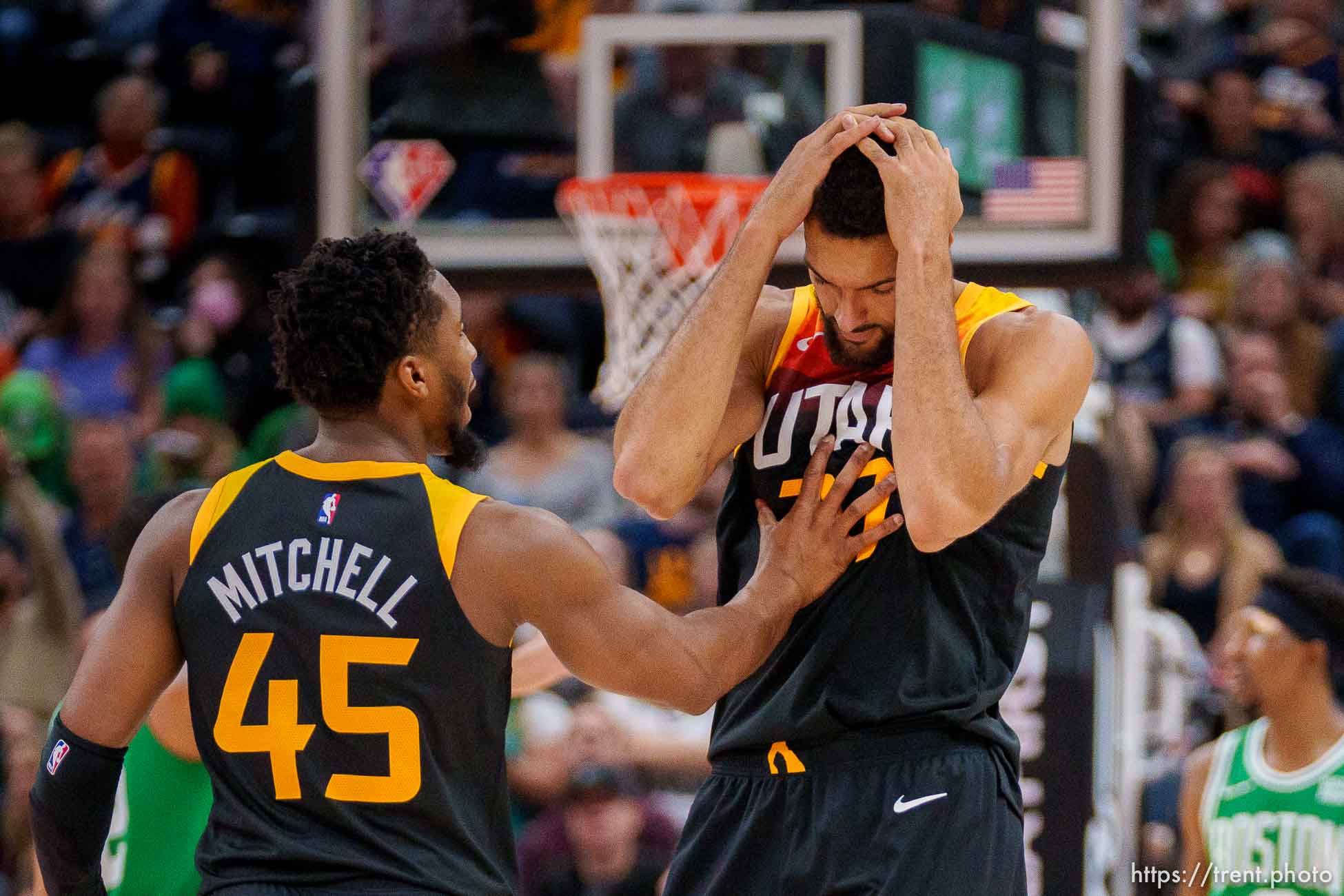 (Trent Nelson  |  The Salt Lake Tribune) Utah Jazz center Rudy Gobert (27) reacts to a foul, with Utah Jazz guard Donovan Mitchell (45) as the Utah Jazz host the Boston Celtics, NBA basketball in Salt Lake City on Friday, Dec. 3, 2021.