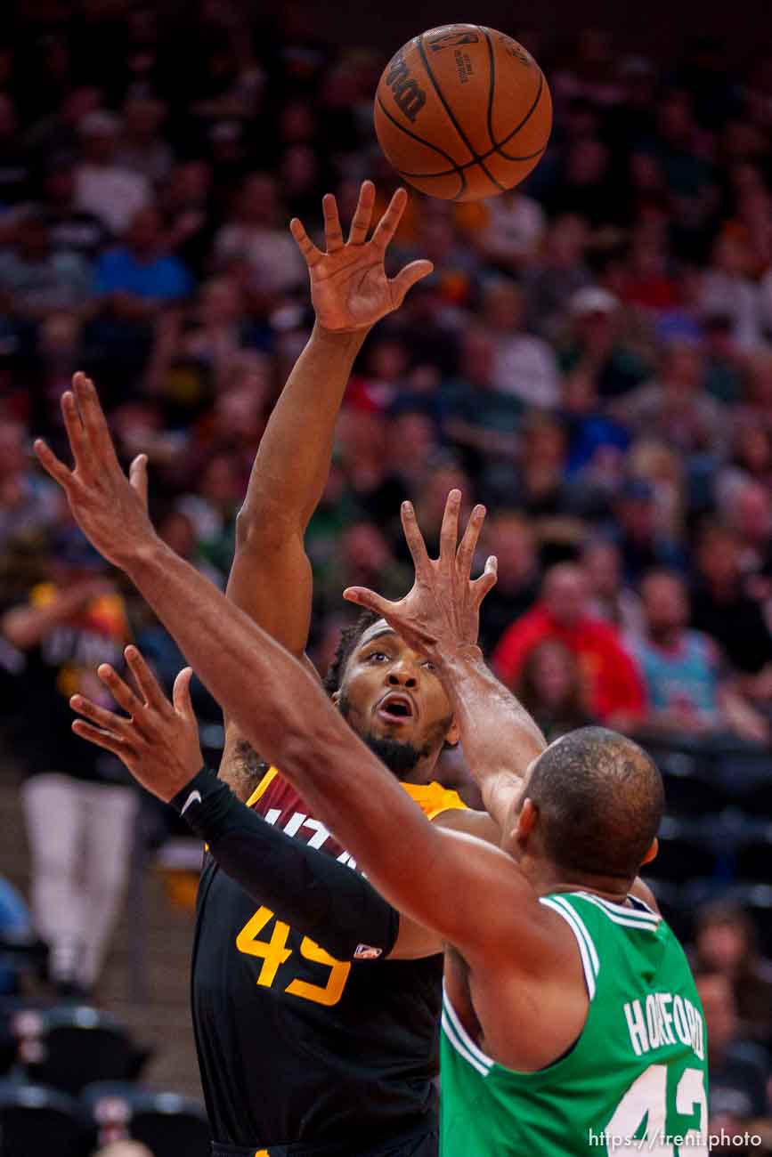 (Trent Nelson  |  The Salt Lake Tribune) Utah Jazz guard Donovan Mitchell (45) shoots over Boston Celtics center Al Horford (42) as the Utah Jazz host the Boston Celtics, NBA basketball in Salt Lake City on Friday, Dec. 3, 2021.