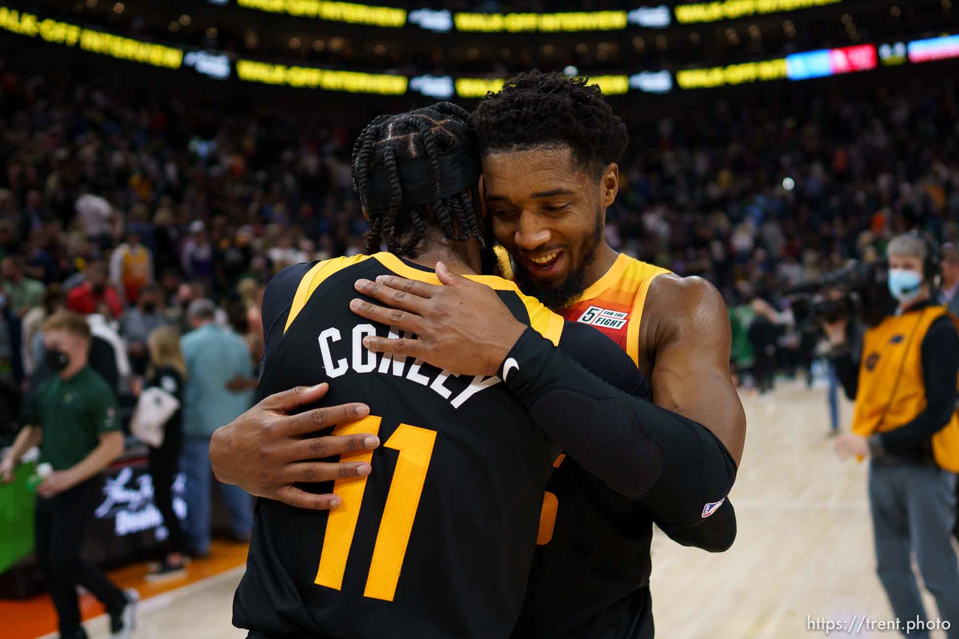 (Trent Nelson  |  The Salt Lake Tribune) Utah Jazz guard Donovan Mitchell (45) and Utah Jazz guard Mike Conley (11) celebrate the win as the Utah Jazz host the Boston Celtics, NBA basketball in Salt Lake City on Friday, Dec. 3, 2021.