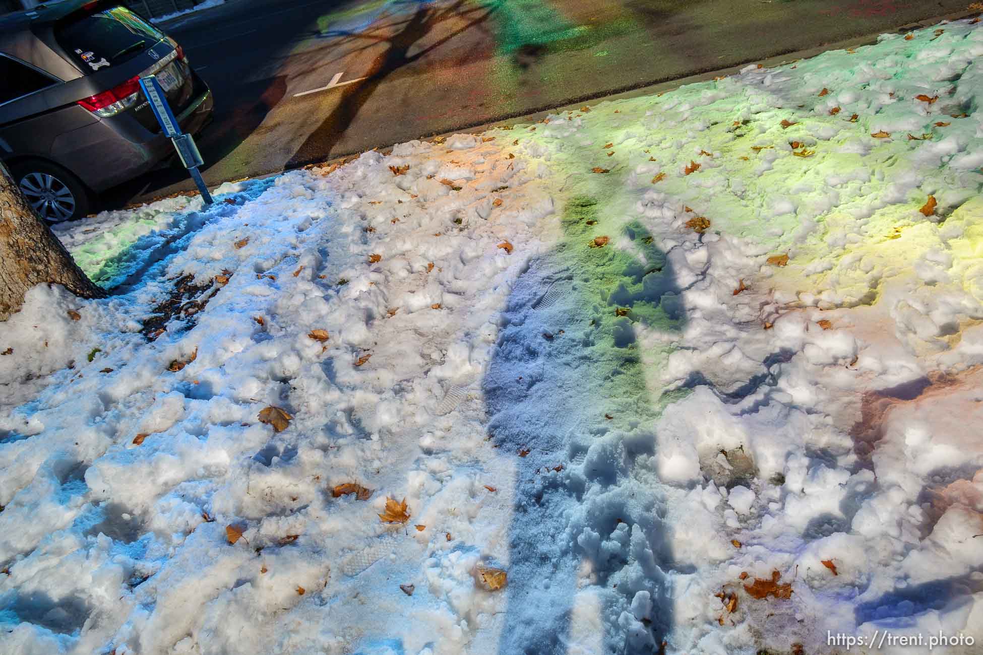 trent shadow on snow reflecting color on Tuesday, Dec. 21, 2021.