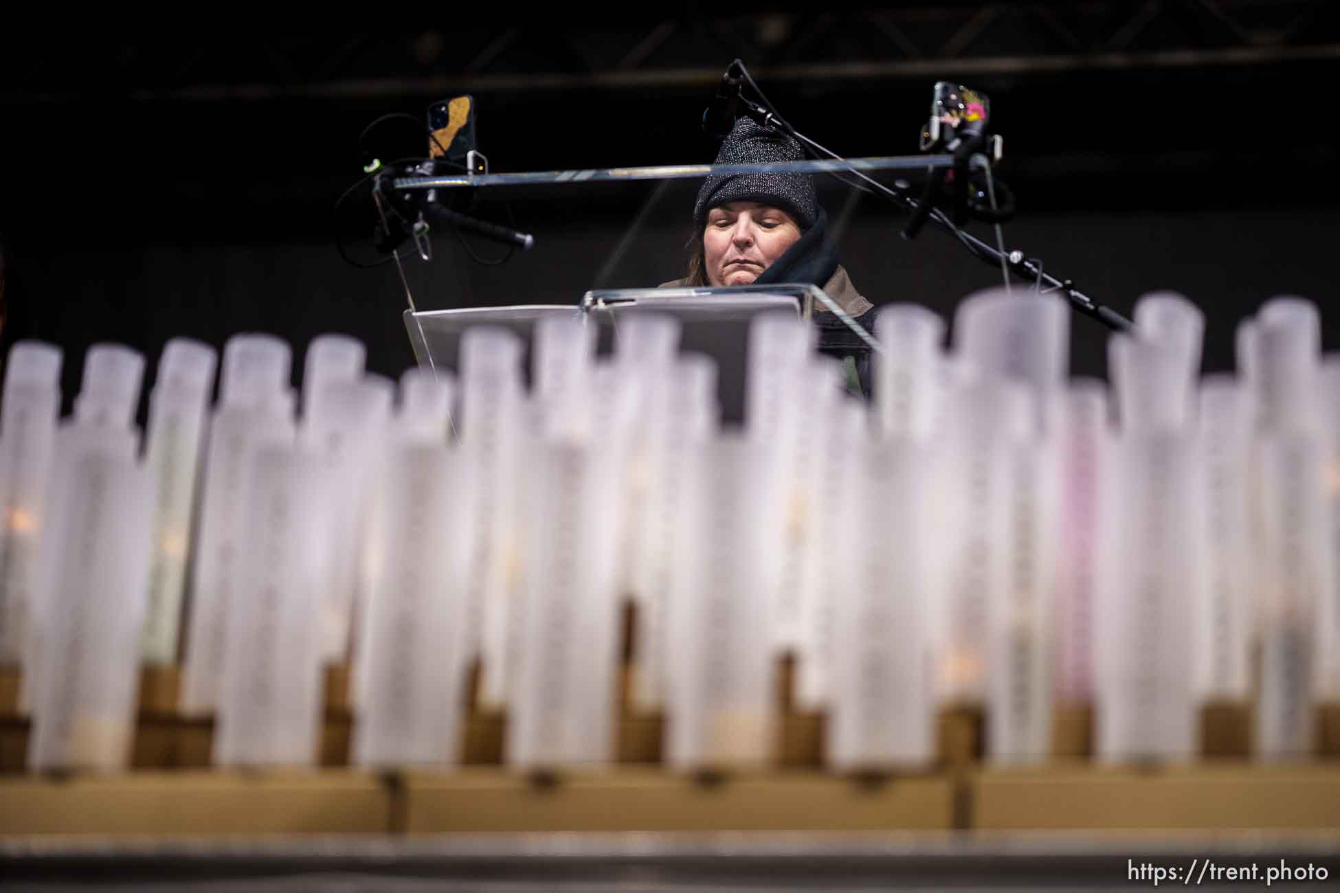 (Trent Nelson  |  The Salt Lake Tribune) Melissa Gledhill reads names at a vigil for 117 people who died in Salt Lake City while experiencing homelessness in the last year, on Tuesday, Dec. 21, 2021.