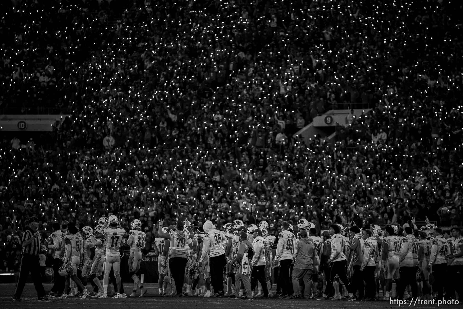 (Trent Nelson  |  The Salt Lake Tribune) Utah fans hold up their phones during a tribute to Utah players Ty Jordan and Aaron Lowe, as the Utah Utes face the Ohio State Buckeyes at the Rose Bowl in Pasadena, Calif., on Saturday, Jan. 1, 2022.