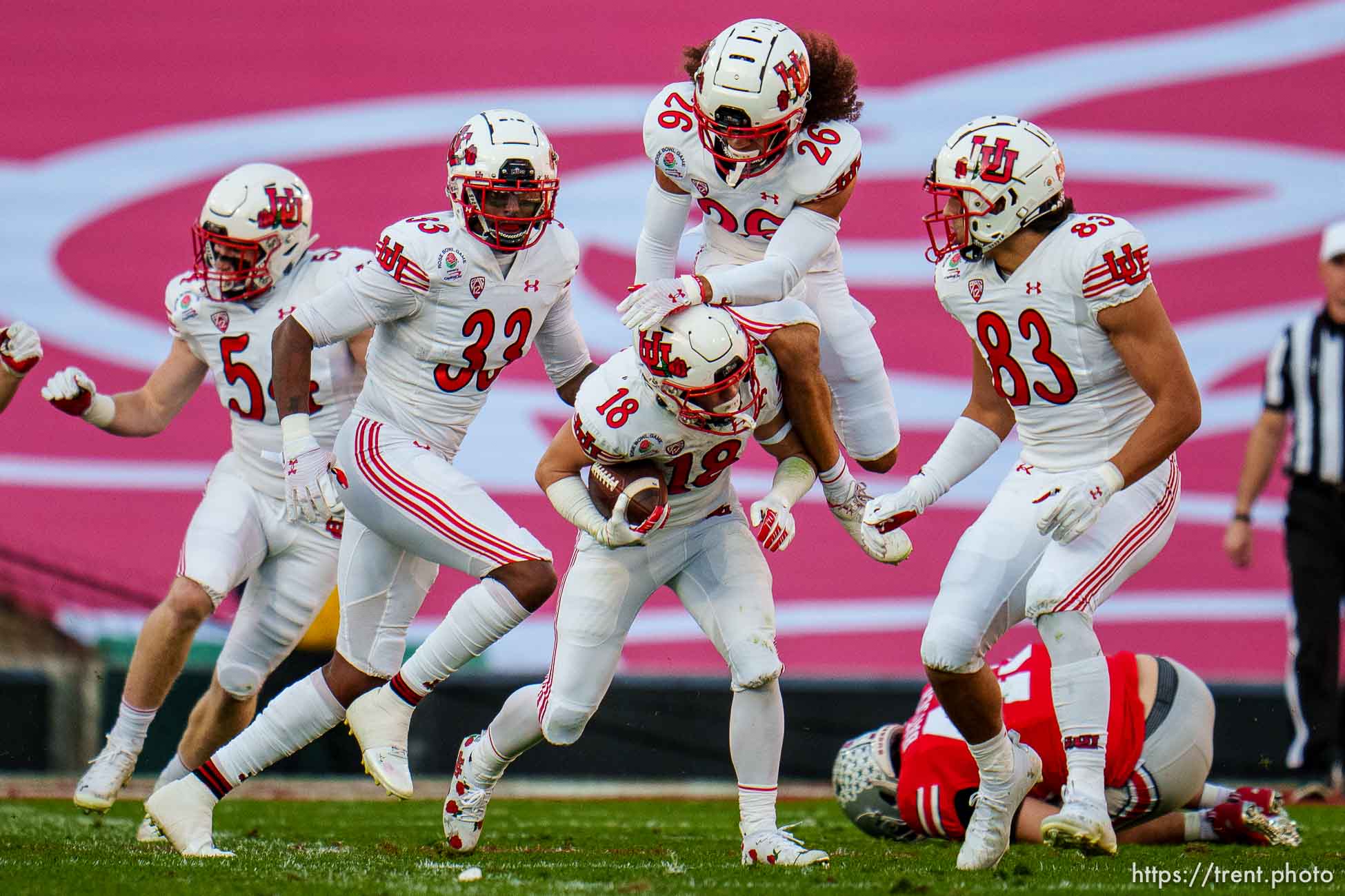 (Trent Nelson  |  The Salt Lake Tribune) Utah Utes wide receiver Britain Covey (18) collides with a teammate while running a kick return for a touchdown as the Utah Utes face the Ohio State Buckeyes at the Rose Bowl in Pasadena, Calif., on Saturday, Jan. 1, 2022.