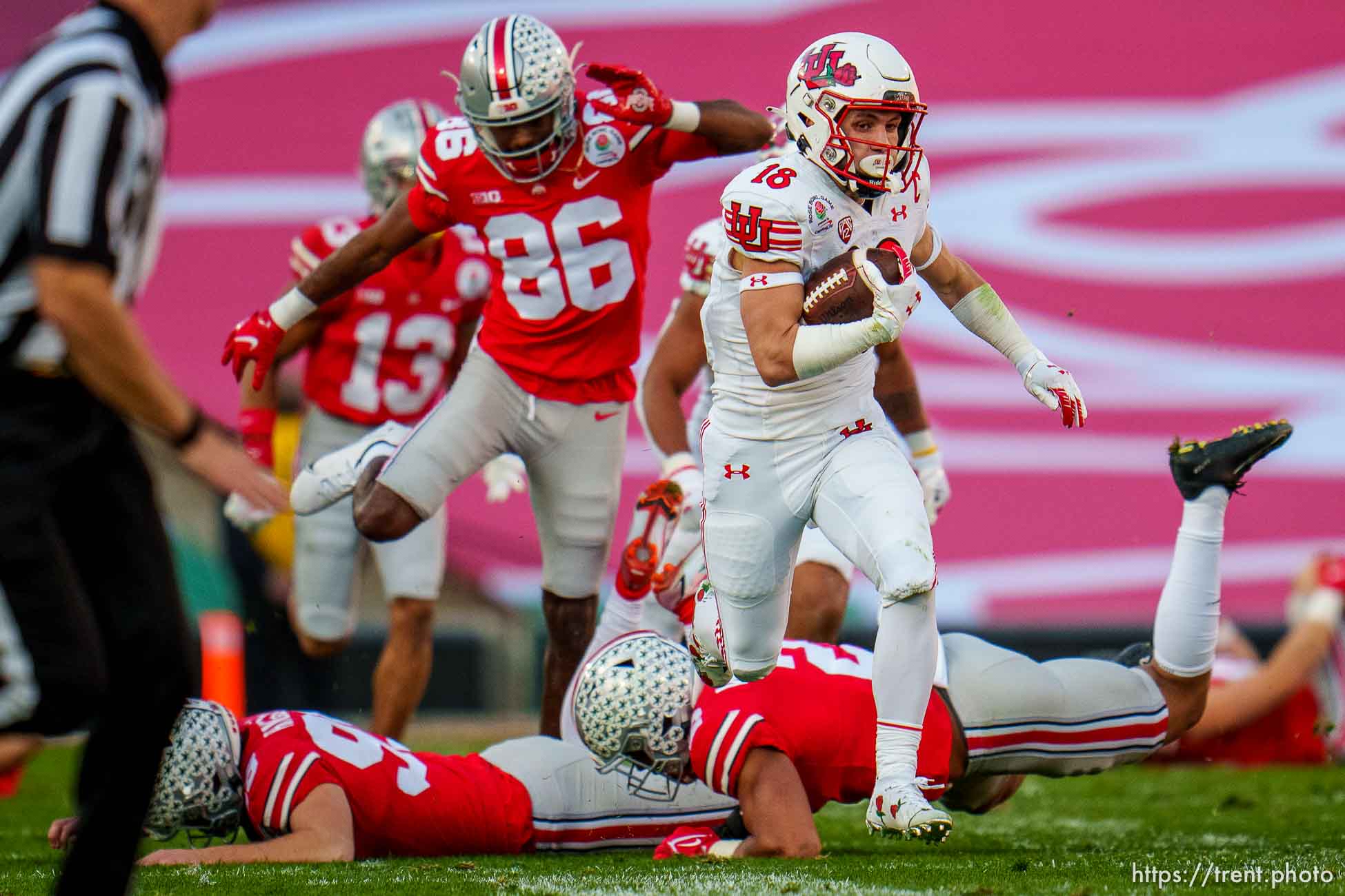 (Trent Nelson  |  The Salt Lake Tribune) Utah Utes wide receiver Britain Covey (18) runs a kick return for a touchdown as the Utah Utes face the Ohio State Buckeyes at the Rose Bowl in Pasadena, Calif., on Saturday, Jan. 1, 2022.