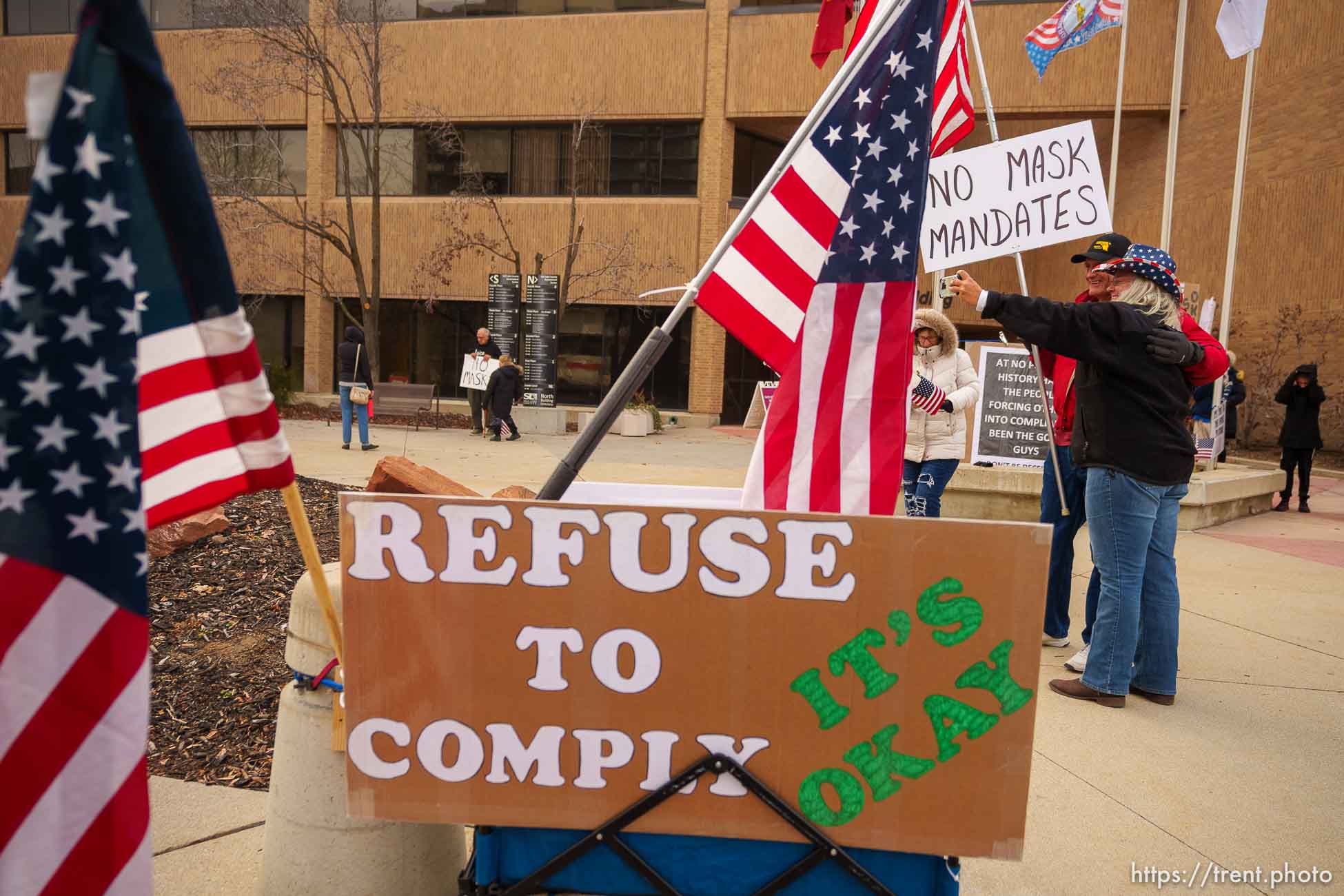 (Trent Nelson  |  The Salt Lake Tribune) People gather as the Salt Lake County Council holds a brief meeting on the mask mandate, in Salt Lake City on Thursday, Jan. 13, 2022.