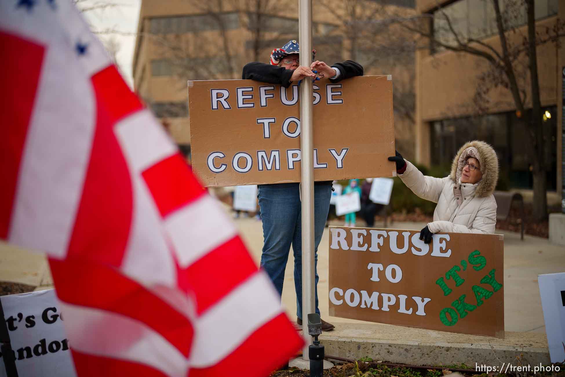 (Trent Nelson  |  The Salt Lake Tribune) People gather as the Salt Lake County Council holds a brief meeting on the mask mandate, in Salt Lake City on Thursday, Jan. 13, 2022.