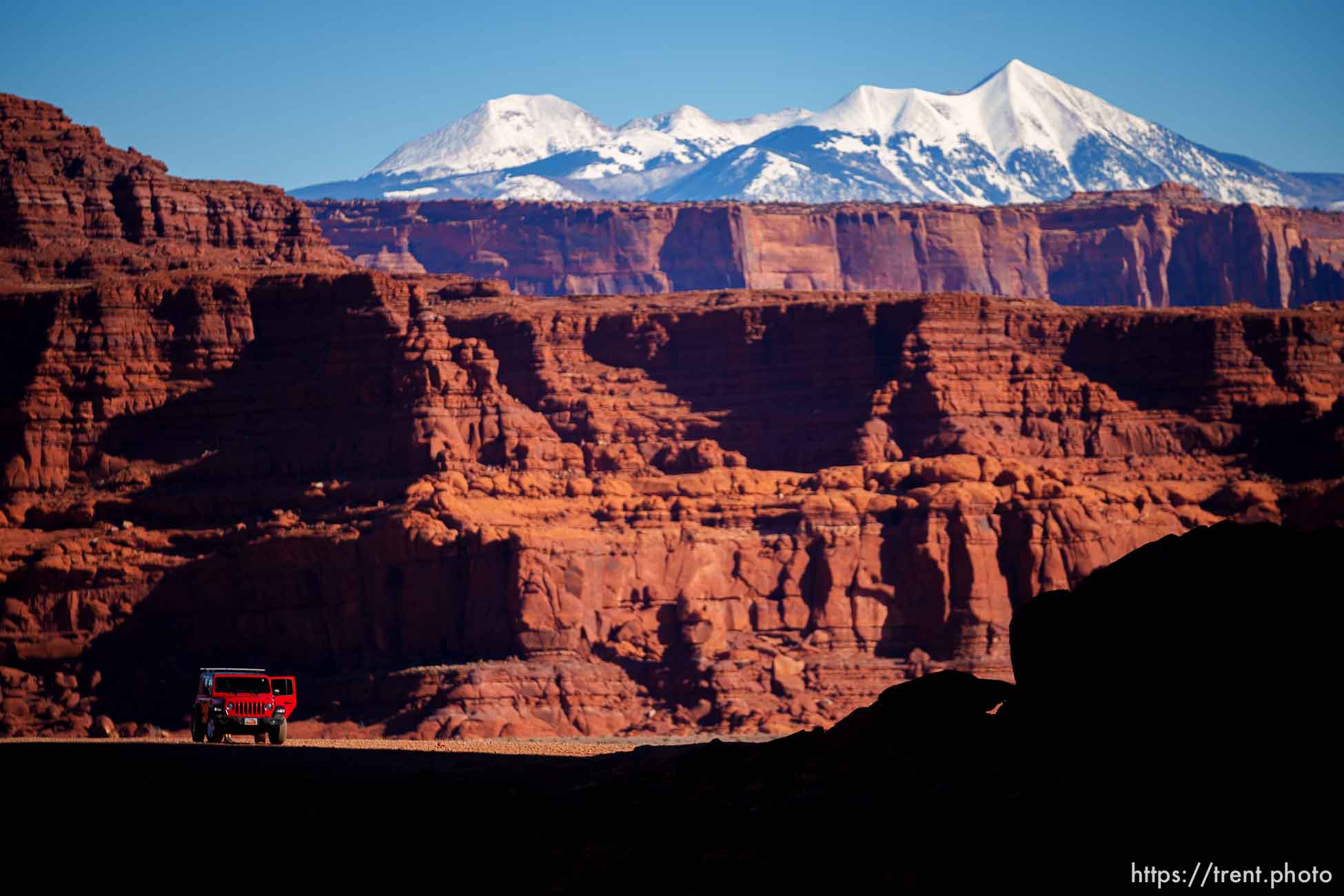 snow-covered la sal mountains la sals peaking out over red rock, from chicken corners, on Saturday, Jan. 15, 2022.