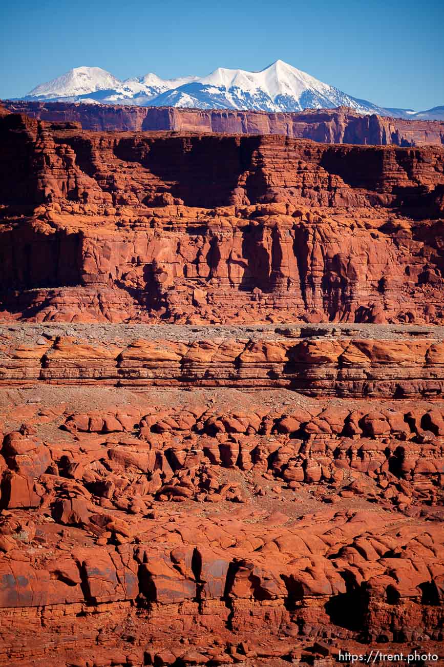 snow-covered la sal mountains la sals peaking out over red rock, from chicken corners, on Saturday, Jan. 15, 2022.