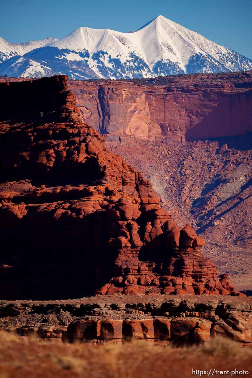 snow-covered la sal mountains la sals peaking out over red rock, from chicken corners, on Saturday, Jan. 15, 2022.