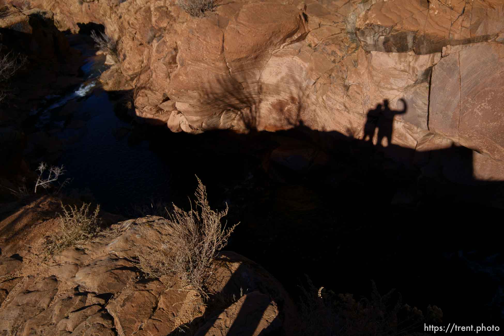 trent, Laura Nelson shadow, millcreek hike, moab, on Sunday, Jan. 16, 2022.