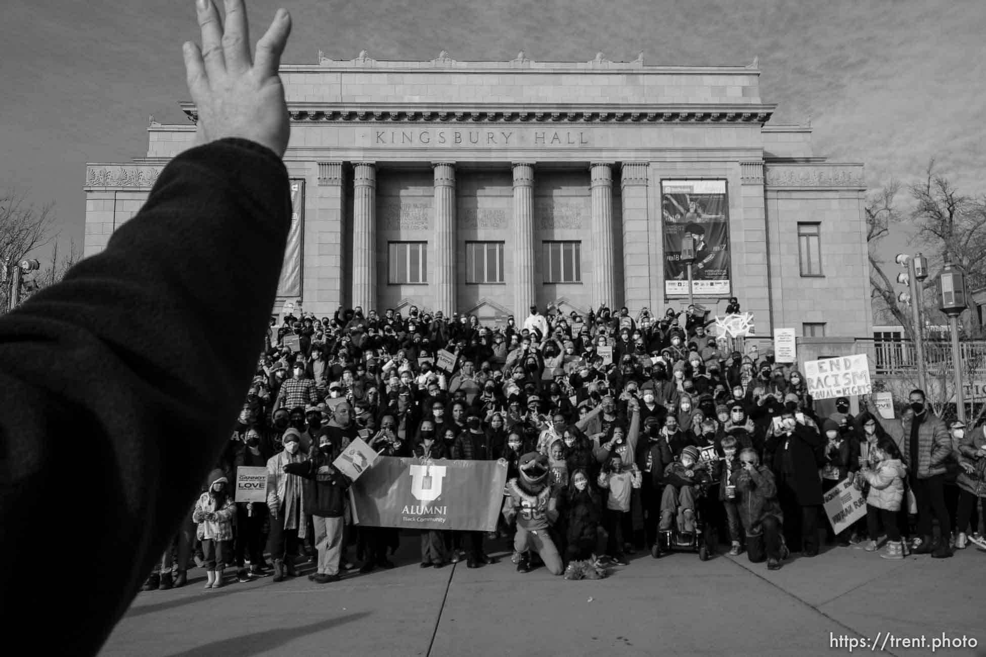 (Trent Nelson  |  The Salt Lake Tribune) People pose for a photo at Kingsbury Hall after marching to celebrate the legacy of Martin Luther King Jr., in Salt Lake City on Monday, Jan. 17, 2022.