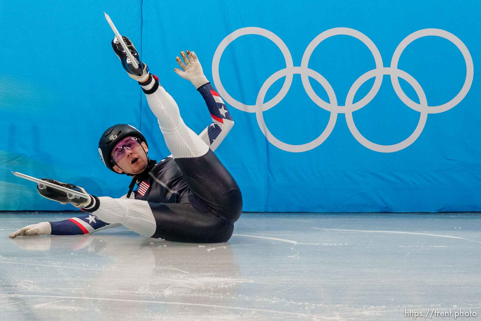 (Trent Nelson  |  The Salt Lake Tribune) Ryan Pivirotto slides into the wall during a qualifying heat for the 1000m, short track speed skating at the 2022 Winter Olympics in Beijing on Saturday, Feb. 5, 2022. After review, Pivirotto was advanced into the quarterfinals.