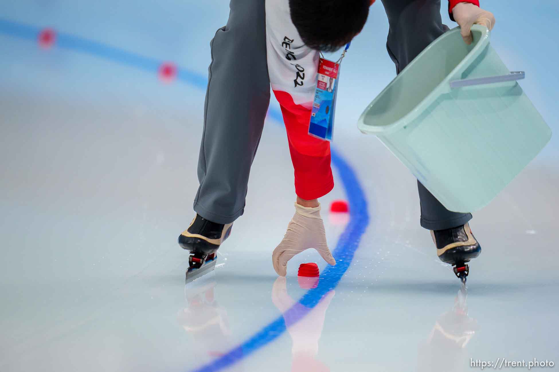 (Trent Nelson  |  The Salt Lake Tribune) A worker preps the ice for the 3000m, speed skating at the 2022 Winter Olympics in Beijing on Saturday, Feb. 5, 2022.