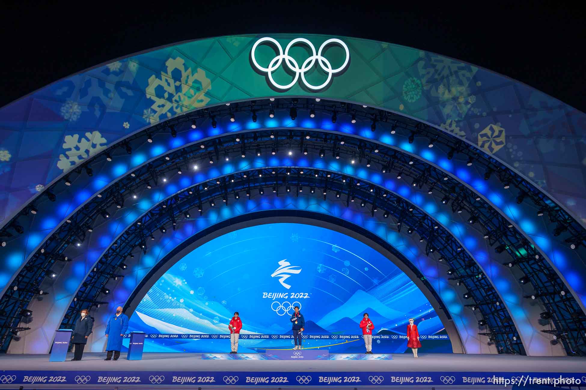 (Trent Nelson  |  The Salt Lake Tribune) Nathan Chen receives his gold medal for men single figure skating at the Beijing Medals Plaza during the 2022 Winter Olympics on Thursday, Feb. 10, 2022. At left is silver medalist Yuma Kagiyama (Japan) and at right is bronze medalist Shoma Uno (Japan).