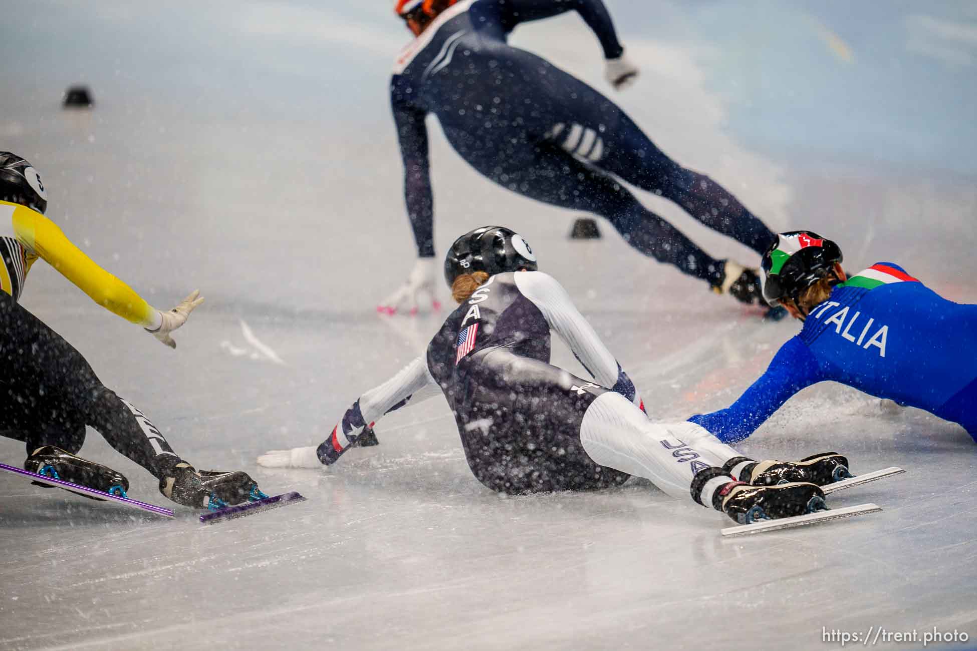 (Trent Nelson  |  The Salt Lake Tribune) Kristen Santos (USA) falls in the 1000m, short track speed skating at the 2022 Winter Olympics in Beijing on Friday, Feb. 11, 2022.