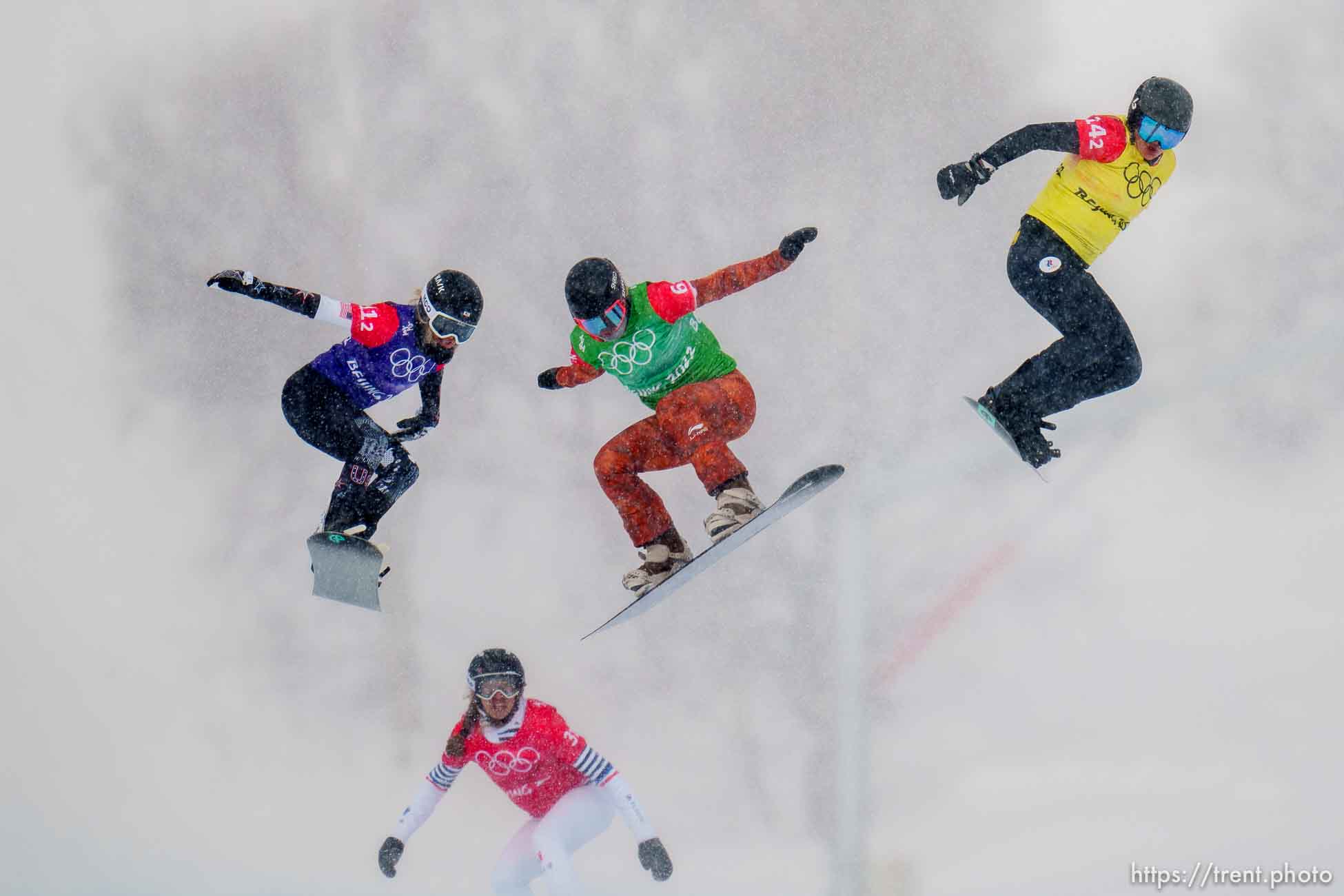 (Trent Nelson  |  The Salt Lake Tribune) Faye Gulini (USA), Chloe Trespeuch (France), Meryeta Odine (Canada), Kristina Paul (ROC) compete in the mixed team snowboard cross at the 2022 Beijing Winter Olympics in Zhangjiakou on Saturday, Feb. 12, 2022.