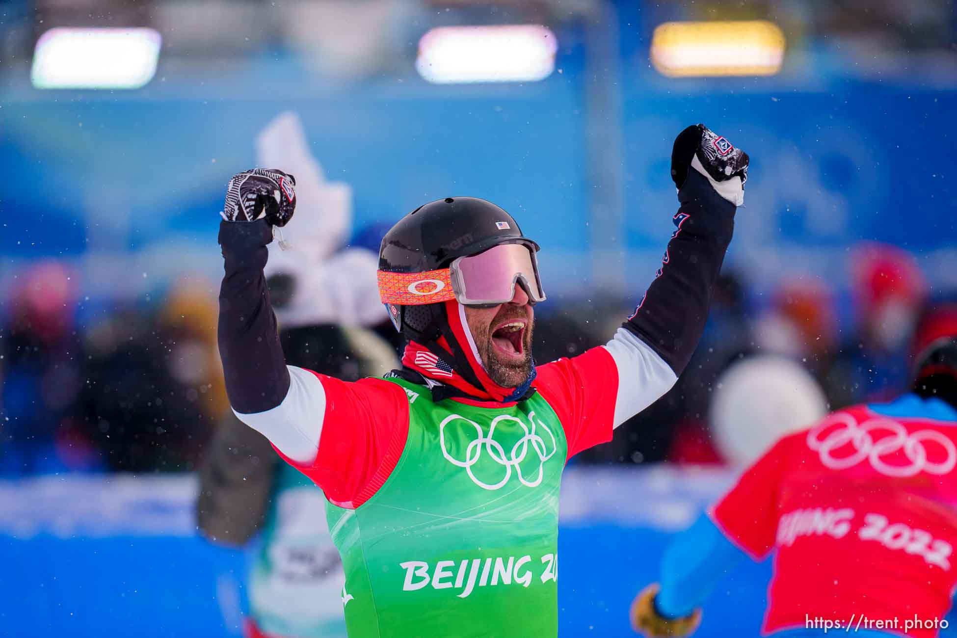 (Trent Nelson  |  The Salt Lake Tribune) Nick Baumgartner (USA) celebrates his gold medal win with teammate Lindsey Jacobellis at mixed team snowboard cross at the 2022 Beijing Winter Olympics in Zhangjiakou on Saturday, Feb. 12, 2022.