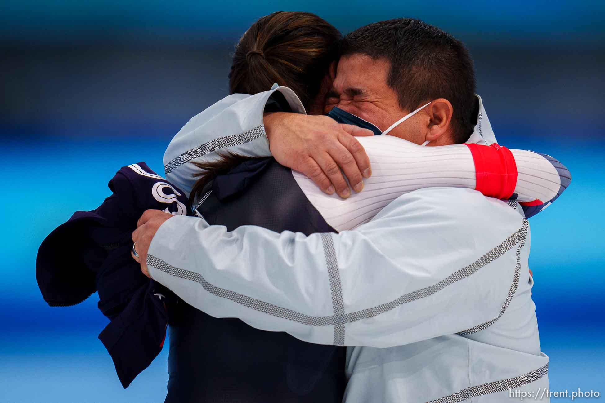 (Trent Nelson  |  The Salt Lake Tribune) Bronze medalist Brittany Bowe (USA) embraces her coach Ryan Shimabukuro after the women's 1000m, speed skating at the 2022 Winter Olympics in Beijing on Thursday, Feb. 17, 2022.