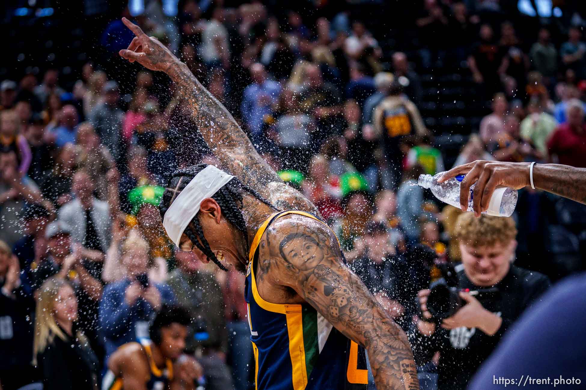 (Trent Nelson  |  The Salt Lake Tribune) Utah Jazz guard Jordan Clarkson (00) is splashed with water by teammates as the Utah Jazz host the Sacramento Kings, NBA basketball in Salt Lake City on Saturday, March 12, 2022. Clarkson finished with a career-high 45 points.