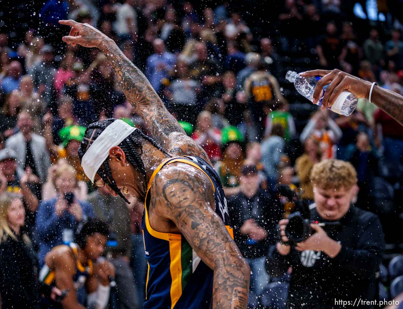 (Trent Nelson  |  The Salt Lake Tribune) Utah Jazz guard Jordan Clarkson (00) is splashed with water by teammates as the Utah Jazz host the Sacramento Kings, NBA basketball in Salt Lake City on Saturday, March 12, 2022. Clarkson finished with a career-high 45 points.