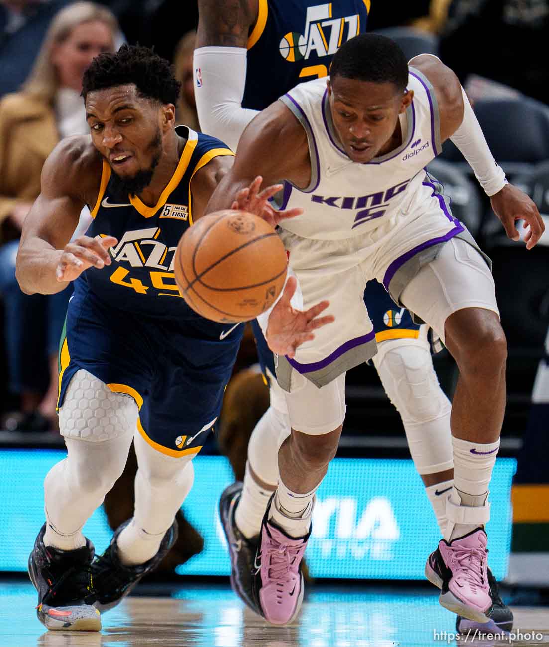 (Trent Nelson  |  The Salt Lake Tribune) Utah Jazz guard Donovan Mitchell (45) tries to steal the ball from Sacramento Kings guard De'Aaron Fox (5) as the Utah Jazz host the Sacramento Kings, NBA basketball in Salt Lake City on Saturday, March 12, 2022.