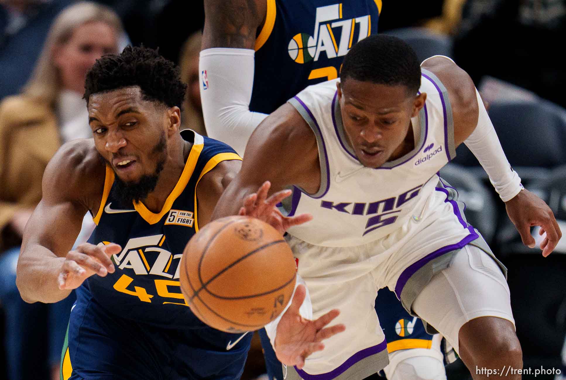 (Trent Nelson  |  The Salt Lake Tribune) Utah Jazz guard Donovan Mitchell (45) tries to steal the ball from Sacramento Kings guard De'Aaron Fox (5) as the Utah Jazz host the Sacramento Kings, NBA basketball in Salt Lake City on Saturday, March 12, 2022.