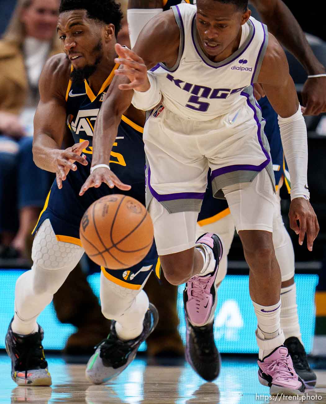 (Trent Nelson  |  The Salt Lake Tribune) Utah Jazz guard Donovan Mitchell (45) tries to steal the ball from Sacramento Kings guard De'Aaron Fox (5) as the Utah Jazz host the Sacramento Kings, NBA basketball in Salt Lake City on Saturday, March 12, 2022.