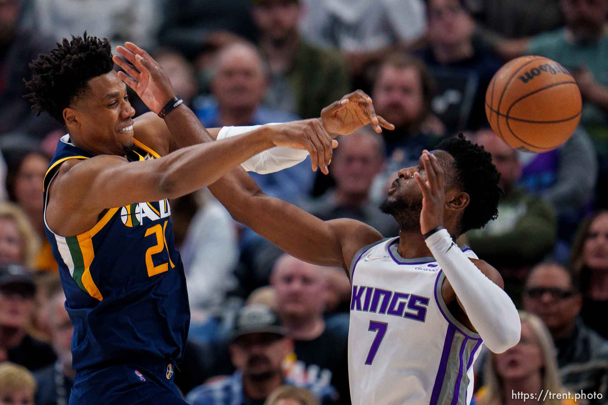 (Trent Nelson  |  The Salt Lake Tribune) Utah Jazz center Hassan Whiteside (21) is fouled by Sacramento Kings forward Chimezie Metu (7) as the Utah Jazz host the Sacramento Kings, NBA basketball in Salt Lake City on Saturday, March 12, 2022.