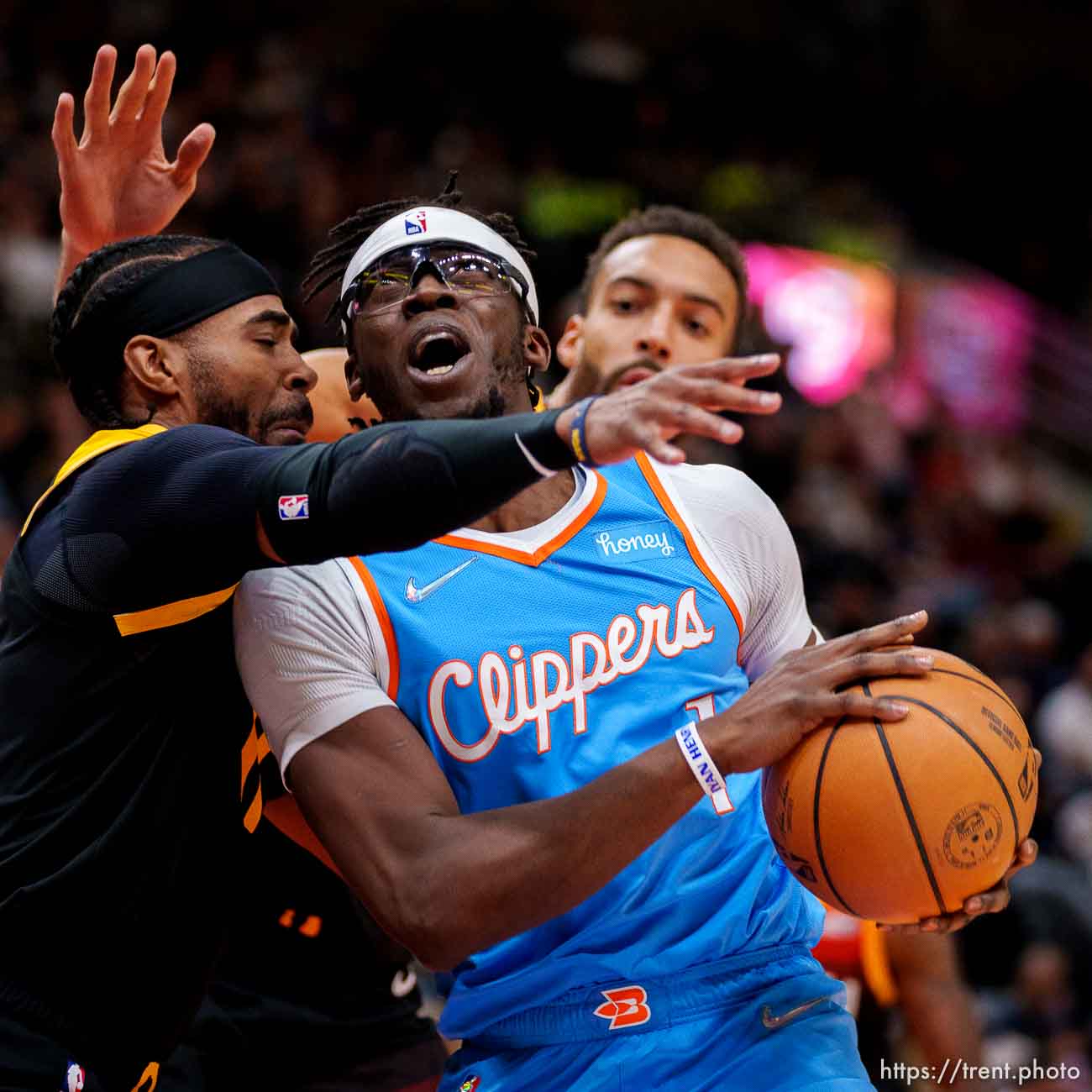 (Trent Nelson  |  The Salt Lake Tribune) Utah Jazz guard Mike Conley (11) defending LA Clippers guard Reggie Jackson (1) as the Utah Jazz host the Los Angeles Clippers, NBA basketball in Salt Lake City on Friday, March 18, 2022.