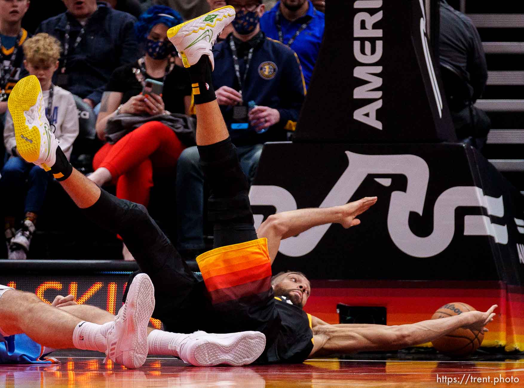 (Trent Nelson  |  The Salt Lake Tribune) Utah Jazz center Rudy Gobert (27) reaches for a loose ball as the Utah Jazz host the Los Angeles Clippers, NBA basketball in Salt Lake City on Friday, March 18, 2022.