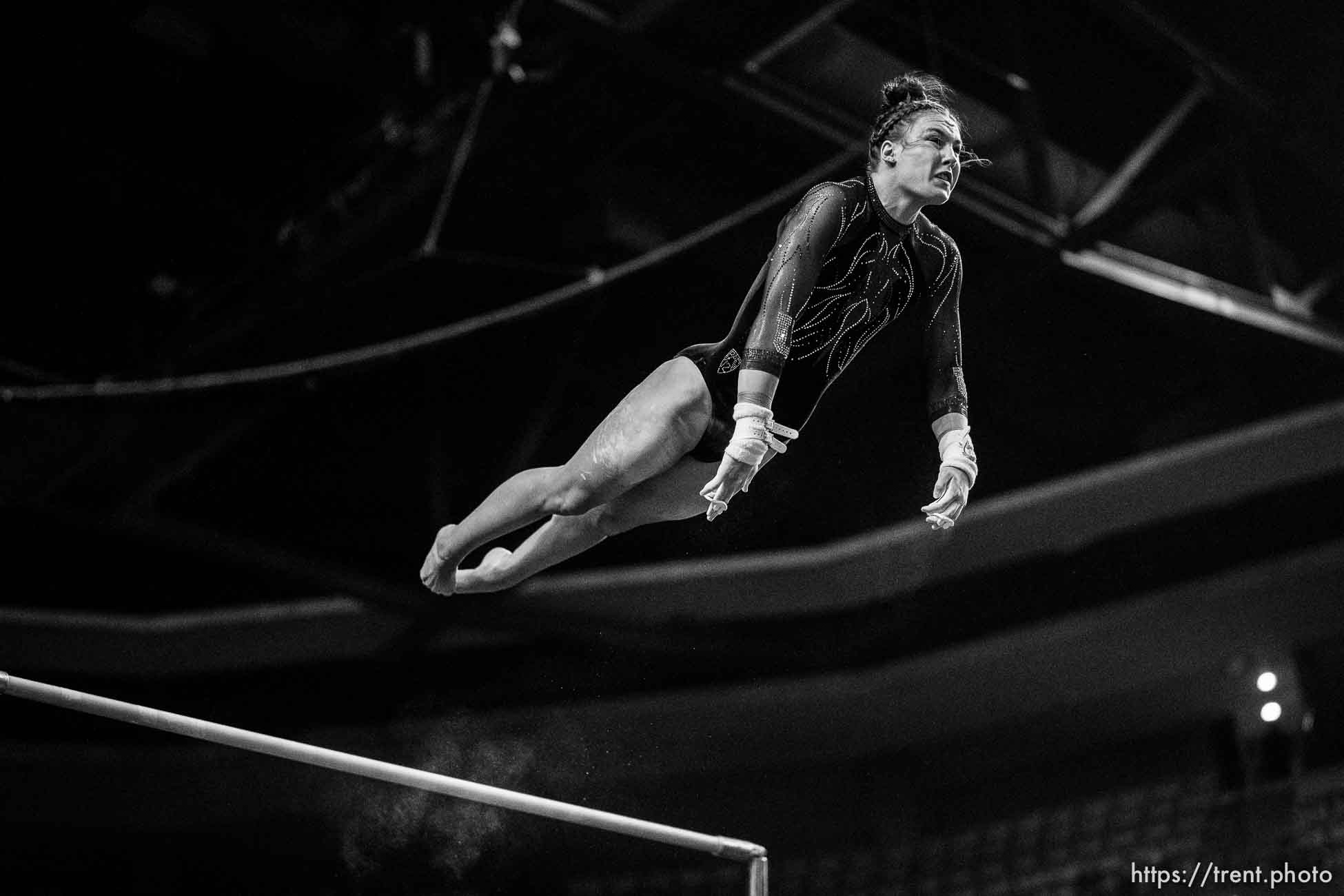 (Trent Nelson  |  The Salt Lake Tribune) Sage Thompson on bars at the Pac-12 gymnastics championships at the Maverik Center in West Valley City on Saturday, March 19, 2022.