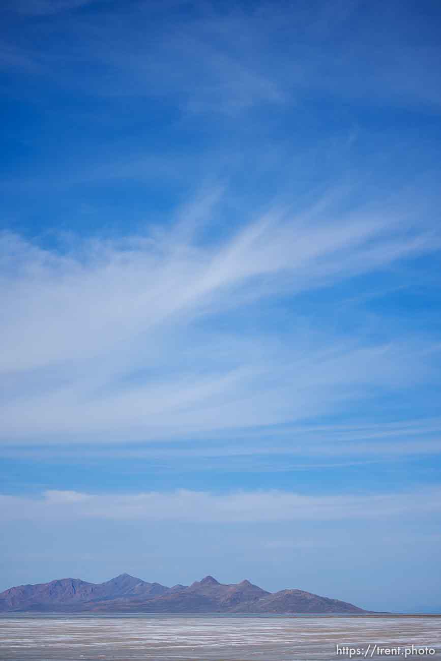 (Trent Nelson  |  The Salt Lake Tribune) Antelope Island and the dry shoreline of the Great Salt Lake on Saturday, March 26, 2022.