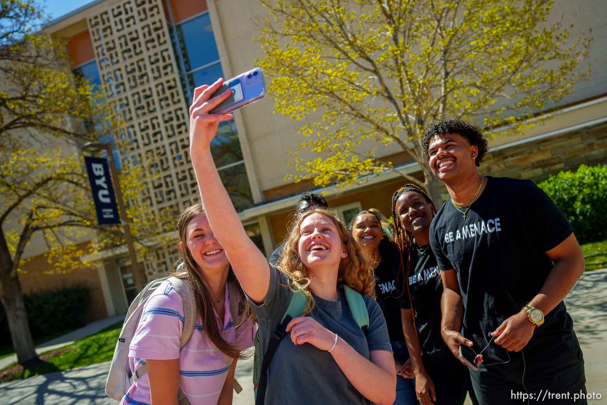 (Trent Nelson  |  The Salt Lake Tribune) Students take a selfie with the Black Menaces at BYU in Provo on Friday, April 8, 2022.