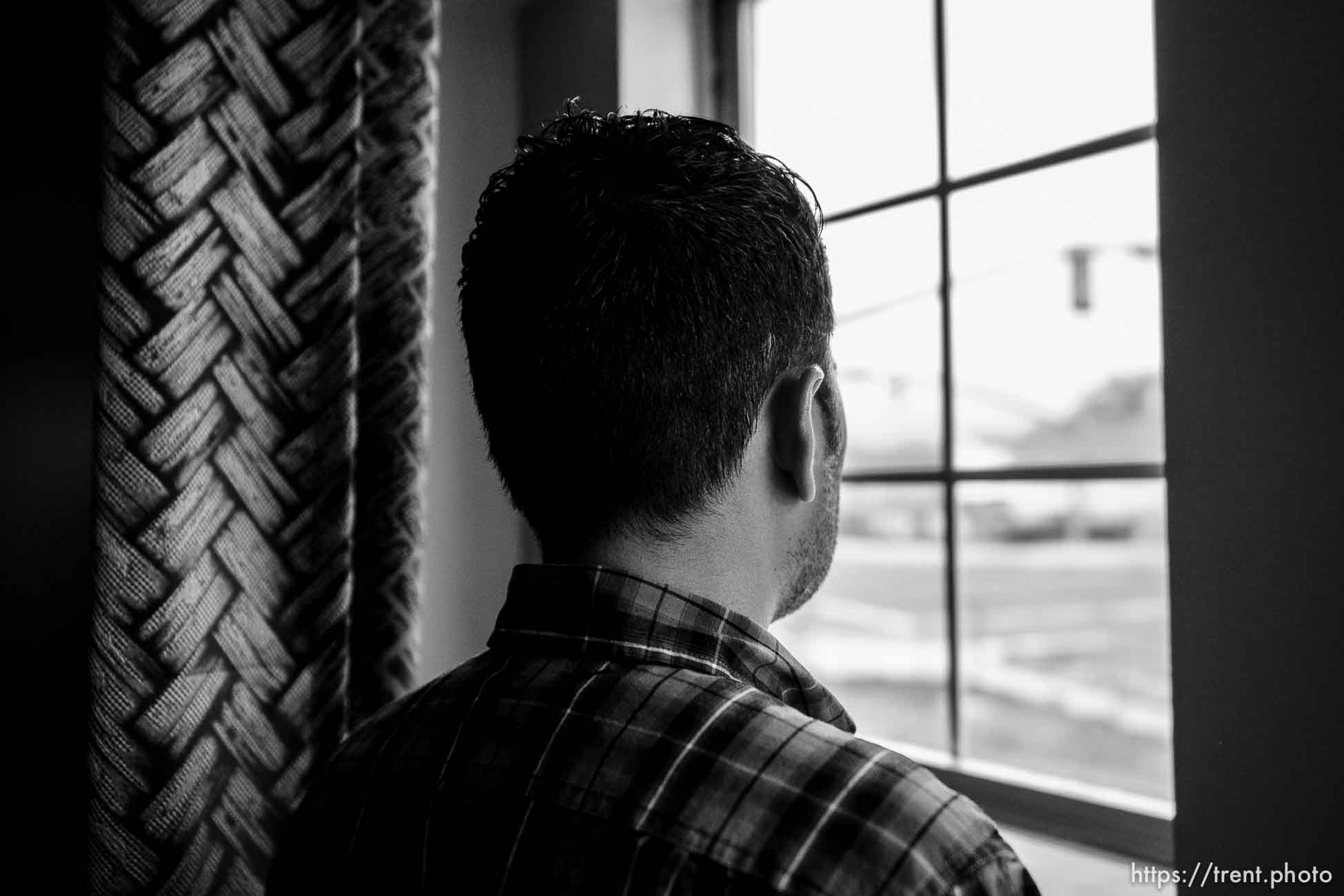 (Trent Nelson  |  The Salt Lake Tribune) Ahmad, an Afghan native who worked as an interpreter for the U.S. Army, at his West Valley City home on Tuesday, April 12, 2022.