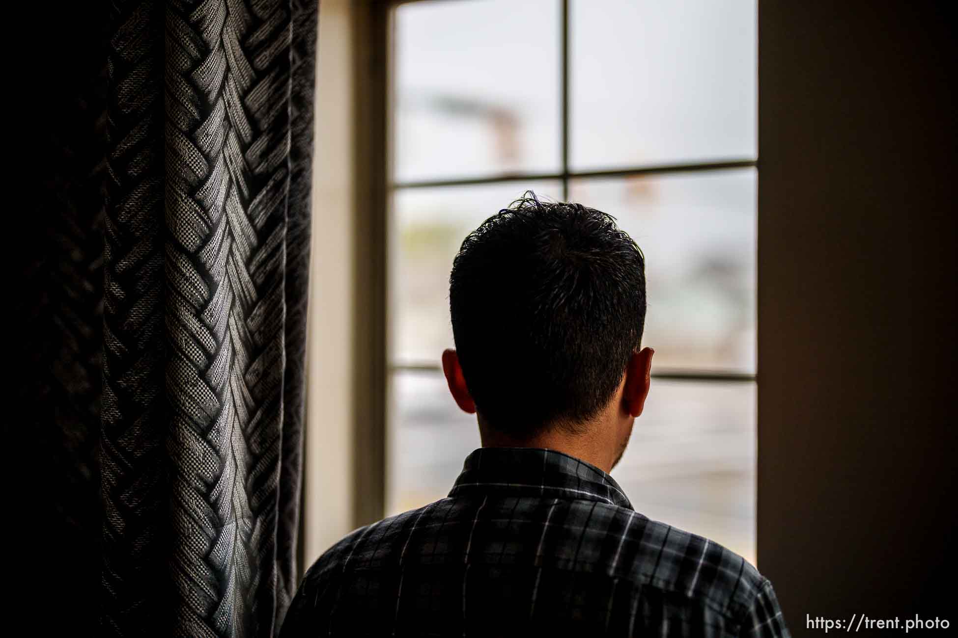 (Trent Nelson  |  The Salt Lake Tribune) Ahmad, an Afghan native who worked as an interpreter for the U.S. Army, at his West Valley City home on Tuesday, April 12, 2022.