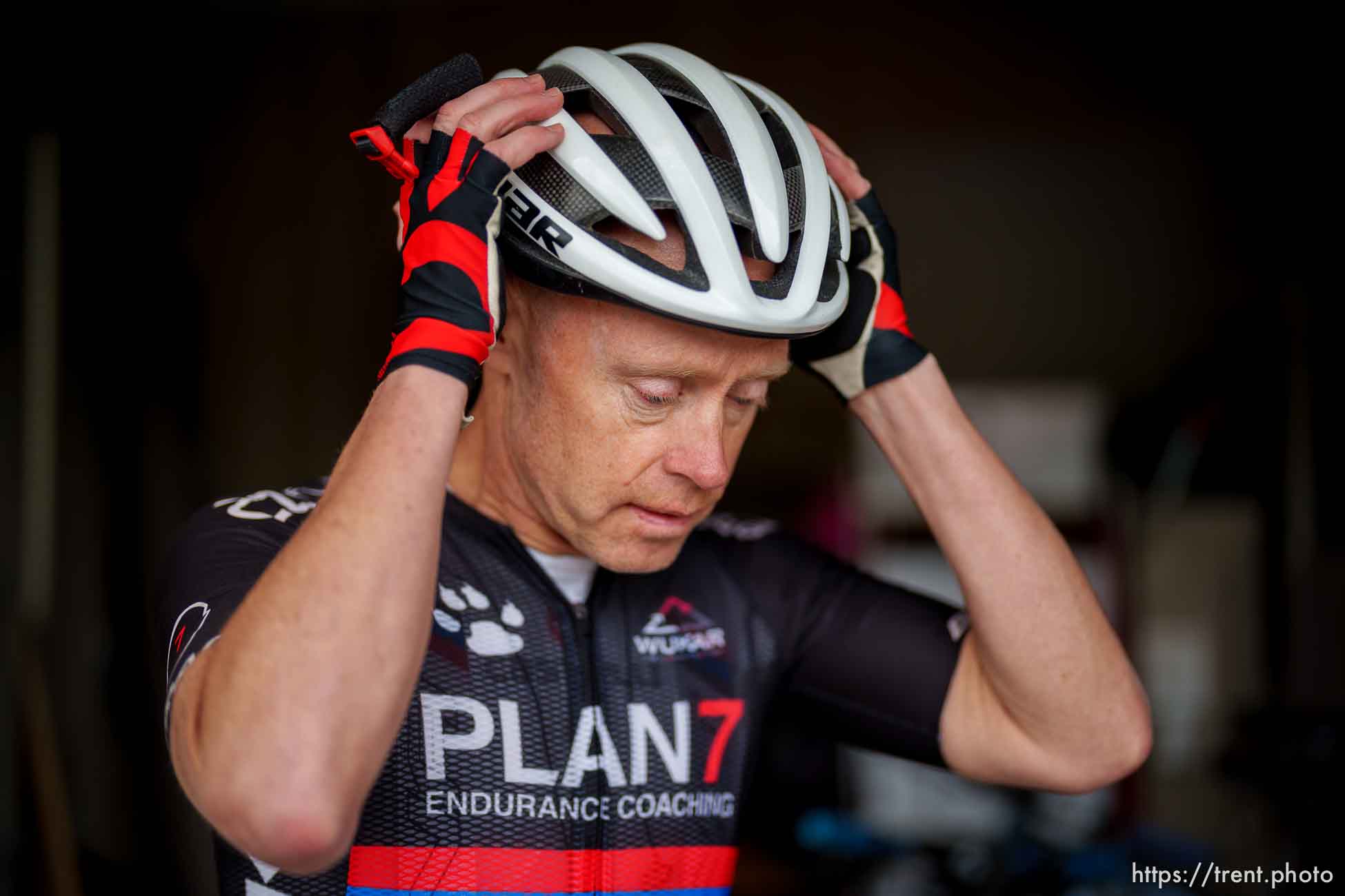 (Trent Nelson  |  The Salt Lake Tribune) Triathlete Kyle Brown gets ready for a bike ride at his home in Fruit Heights on Tuesday, April 26, 2022.