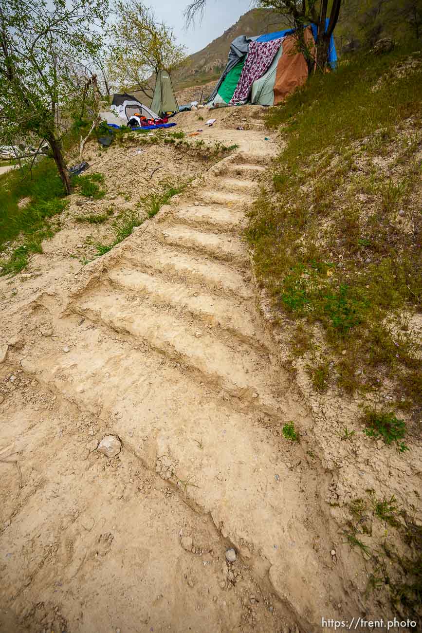 (Trent Nelson  |  The Salt Lake Tribune) A staircase cut into the hillside leads to a camp east of Victory Road in the foothills north of Salt Lake City on Wednesday, April 27, 2022.